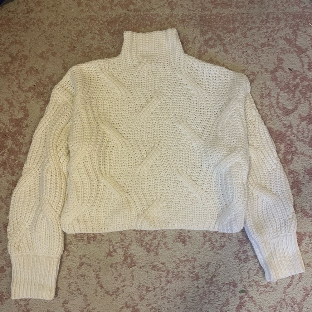 White turtleneck sweater